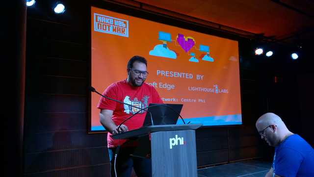 Rami Sayar presenting at a Make Web Not War event in 2016